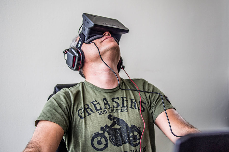 A man wearing a VR headset. Source: Wikimedia Commons.