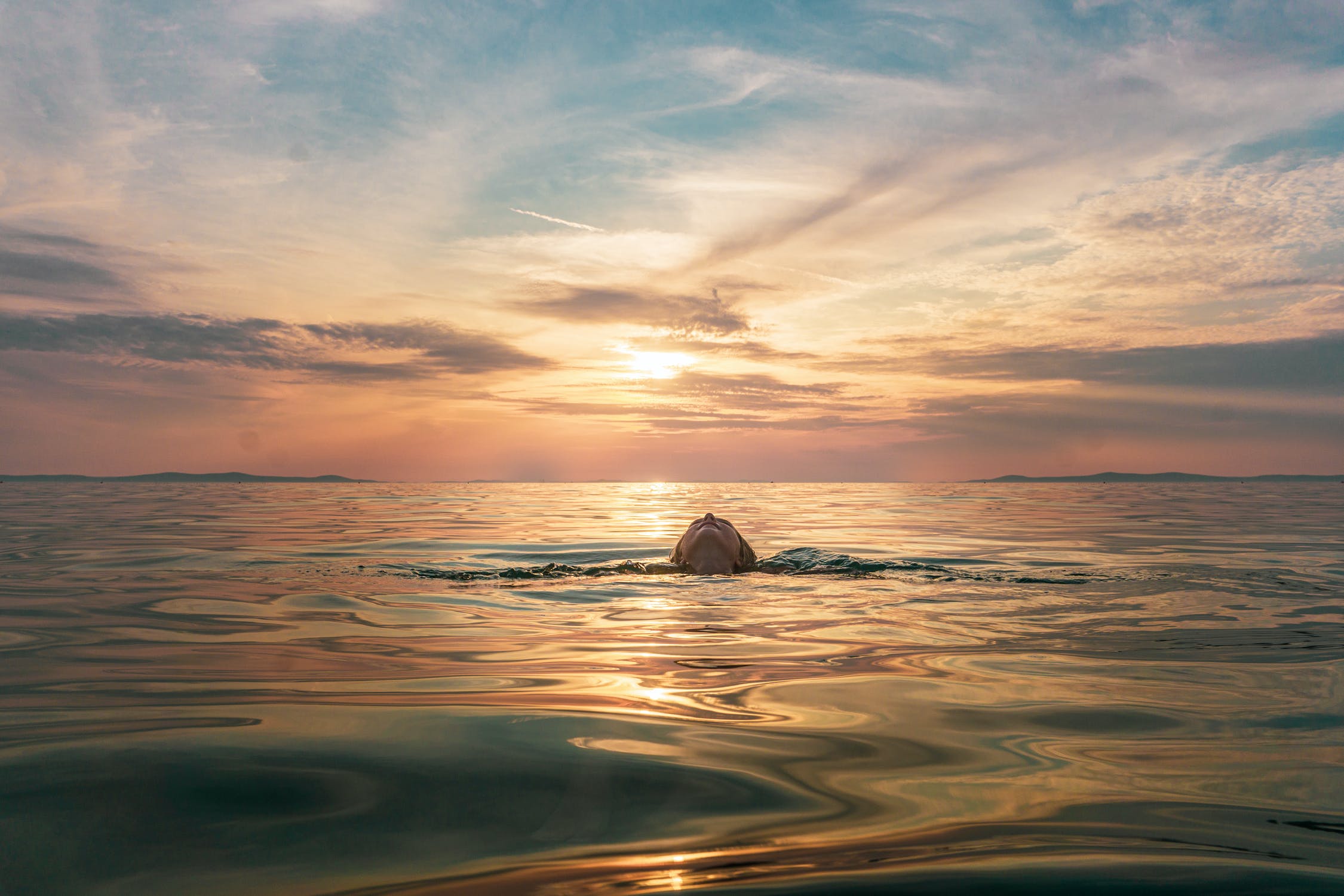 A sunset above a calm ocean